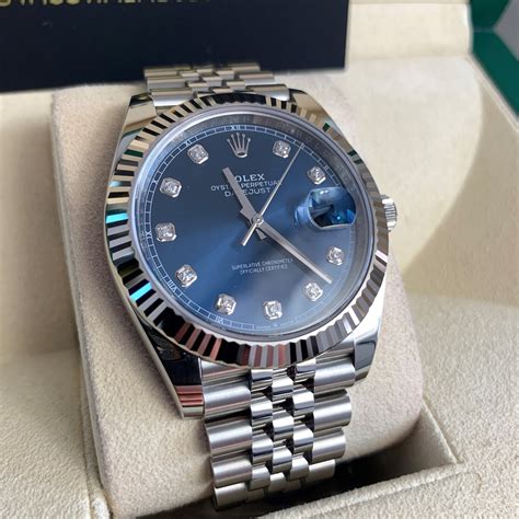 blue dial rolex|Rolex watch with blue face.